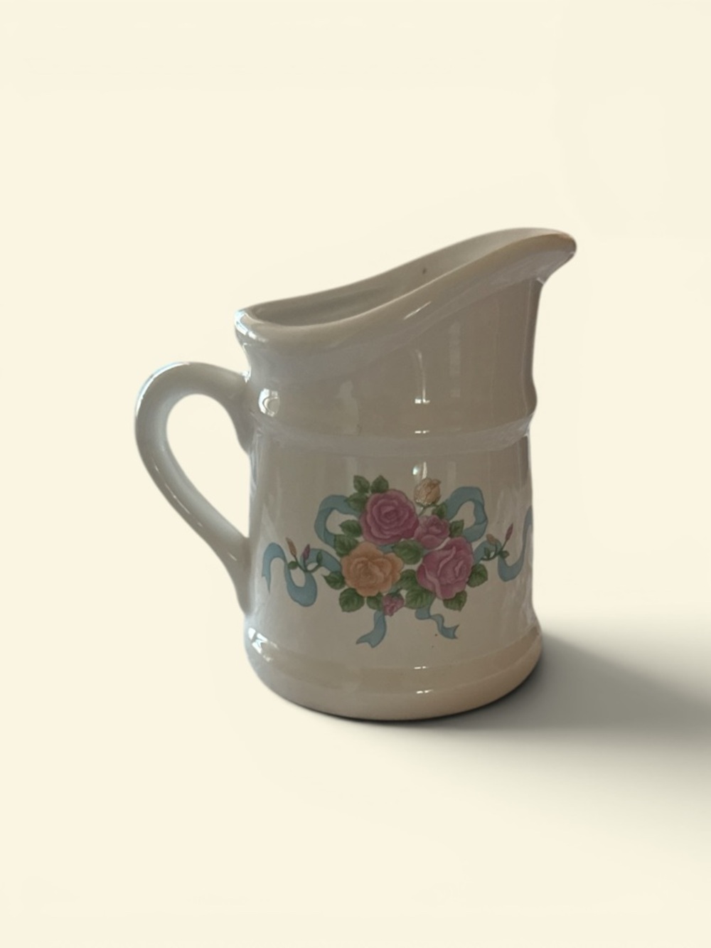 Cream Ceramic Pitcher with Pink Rose and Blue Ribbon Floral Accent